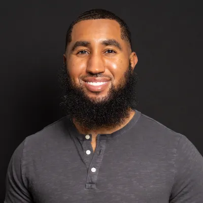 Devon Waring Image with grey shirt and beard