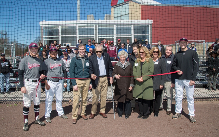 a crowd assembles to celebrate new developments on the baseball field