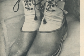 black and white photo of lace-up socks 