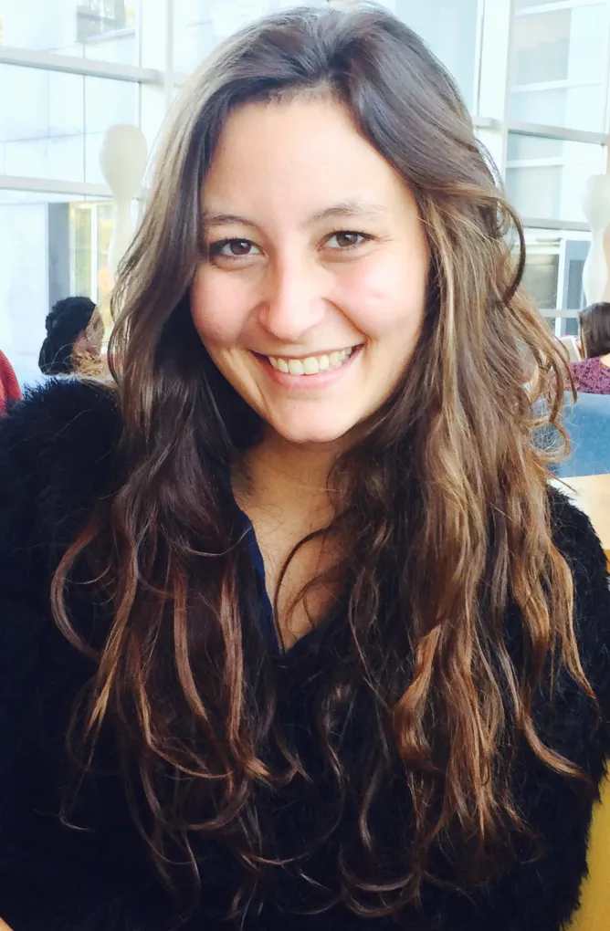 Headshot of Raffaella Luzi Stoutland '17. She is indoors and smiling at the camera.