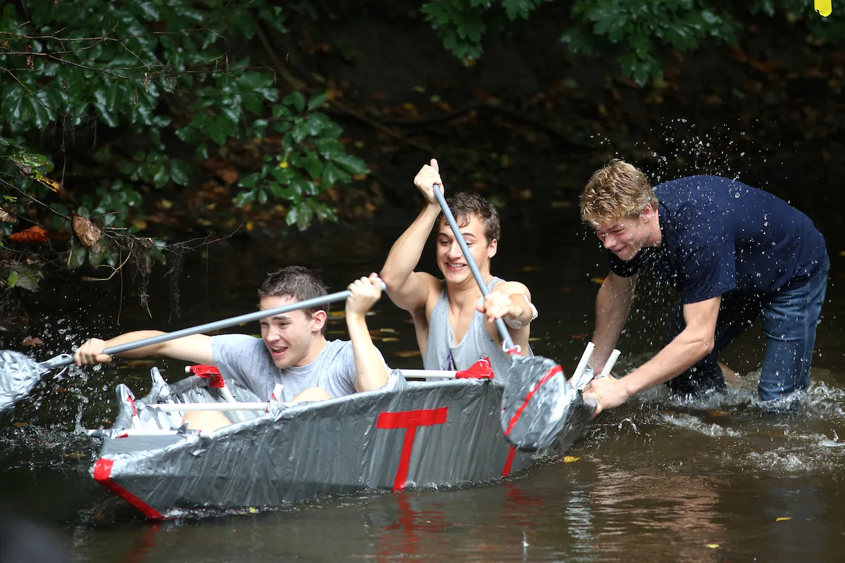 Students in a boat made of duct tape