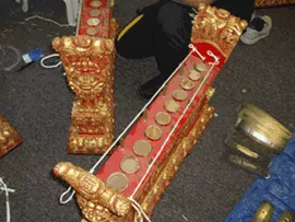 Gangsa cases with keys removed, showing the tops of the bamboo resonators.