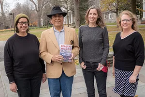 Braulio Munoz with library staff