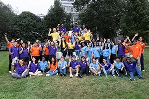 Students in group photo on lawn