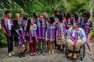 Group of students wearing stoles that "Summer Scholars Program"