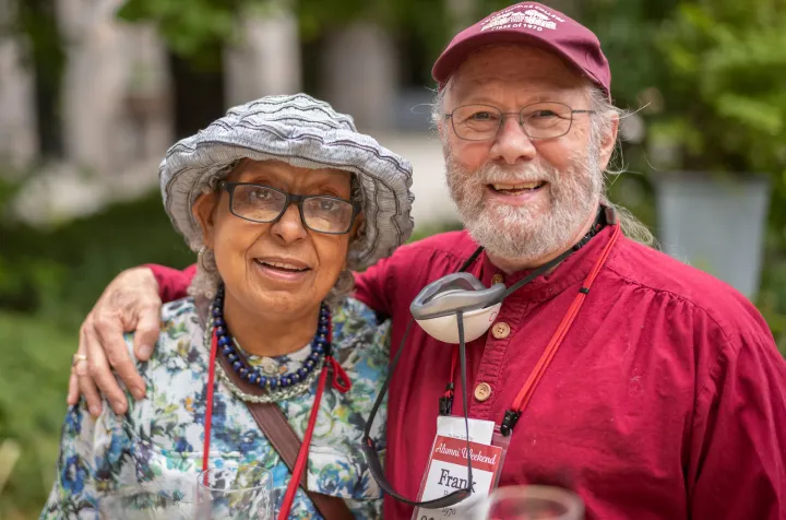 Two people pose at alumni weekend