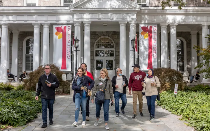 People walk on campus