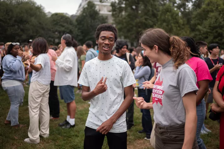 Group of students do icebreakers on Parrish Beach