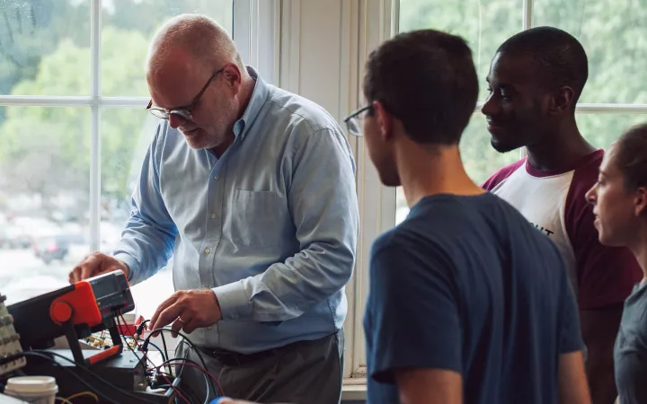 faculty working with students