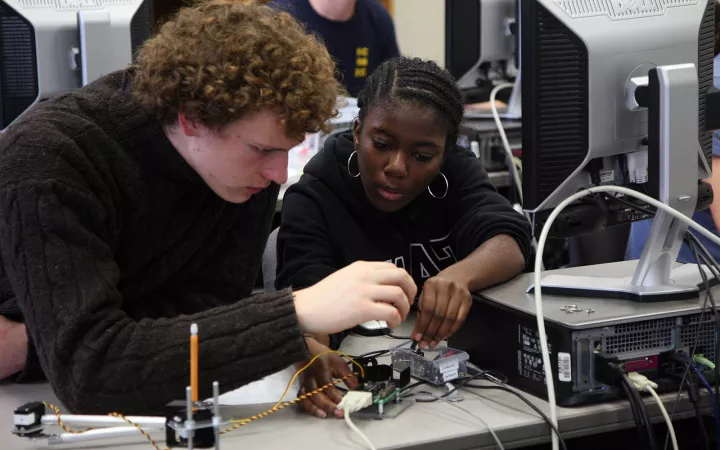 two students working together