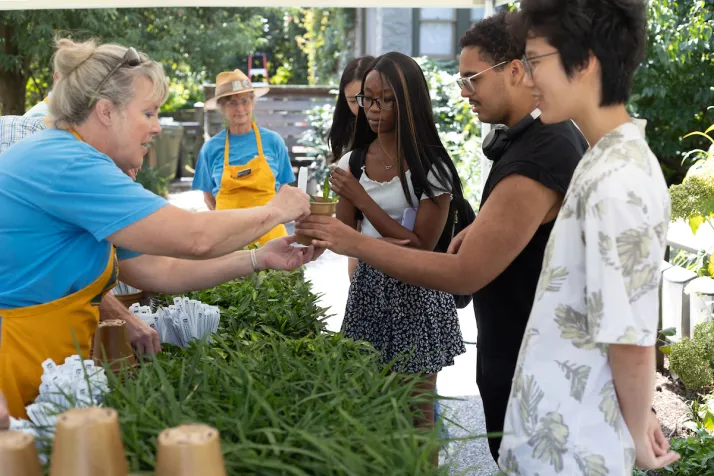 Students receive plants at arboretum giveaway