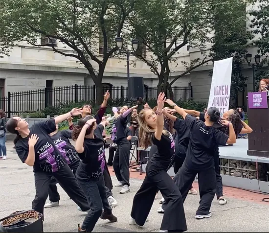 Dancers perform outside City Hall