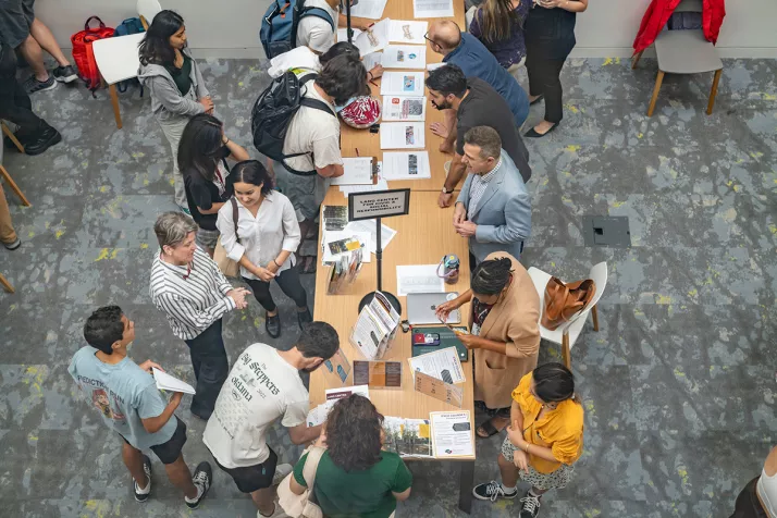 Overhead view of academic advising fair in Singer Hall