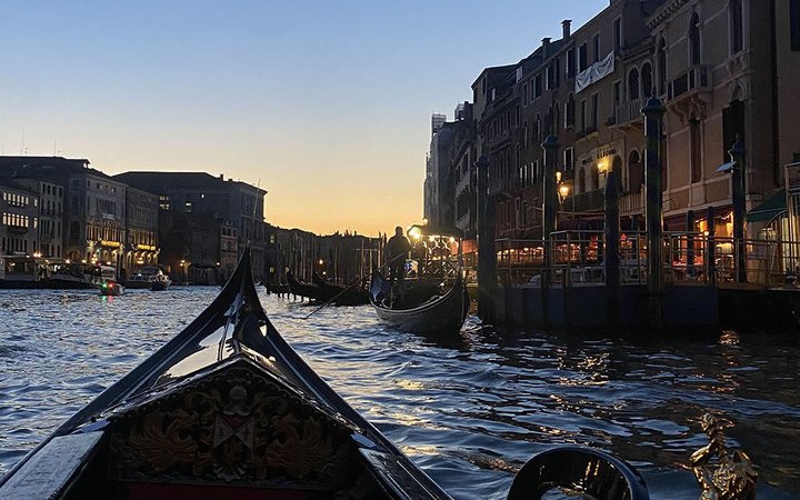 photo taken from a boat in a city canal