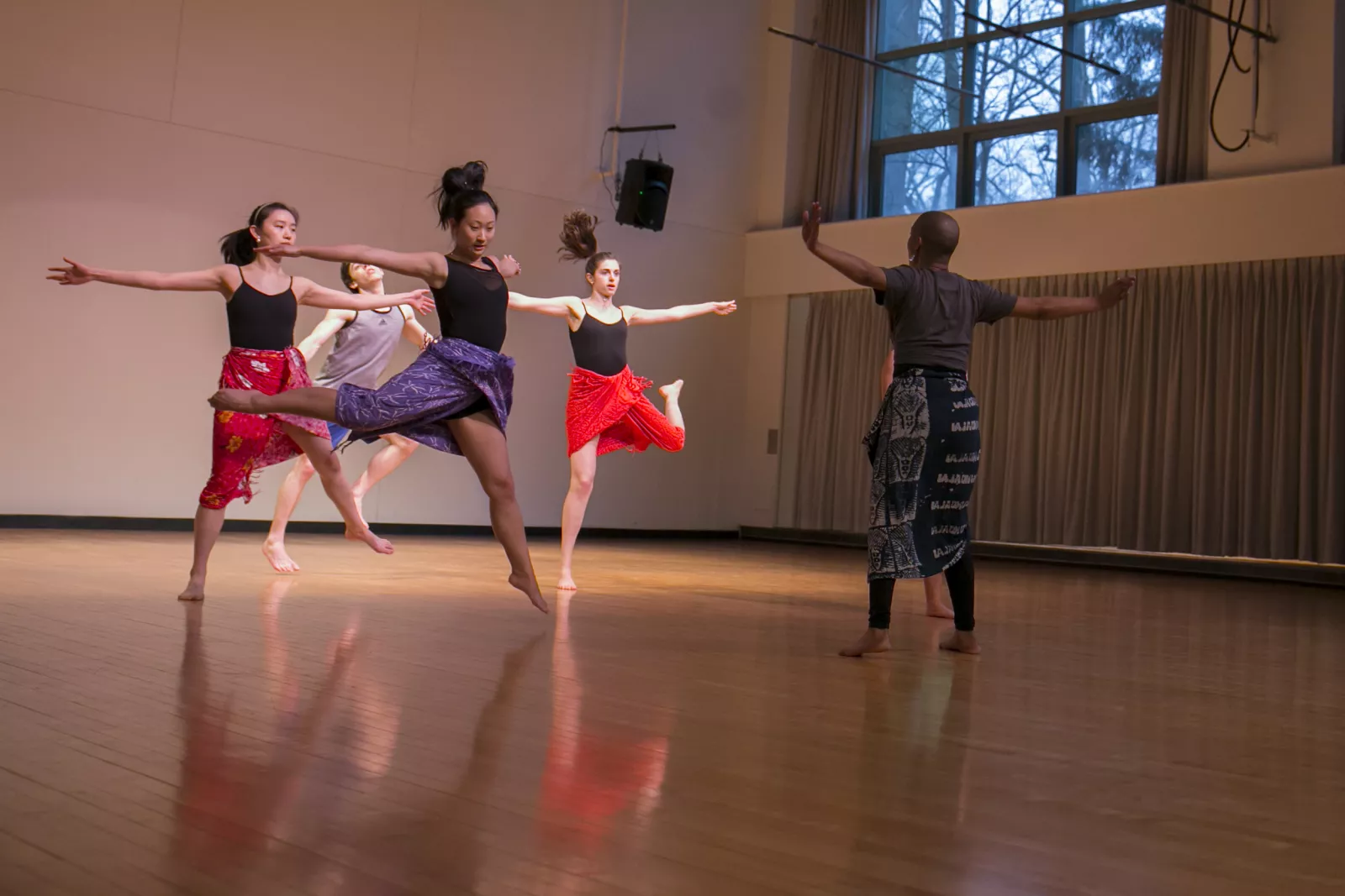 Students practicing African dance. 