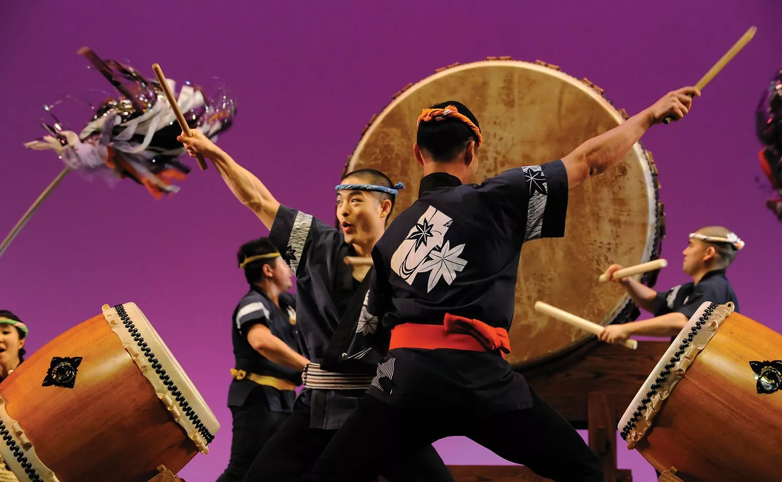 San Jose Taiko performs with drums. 