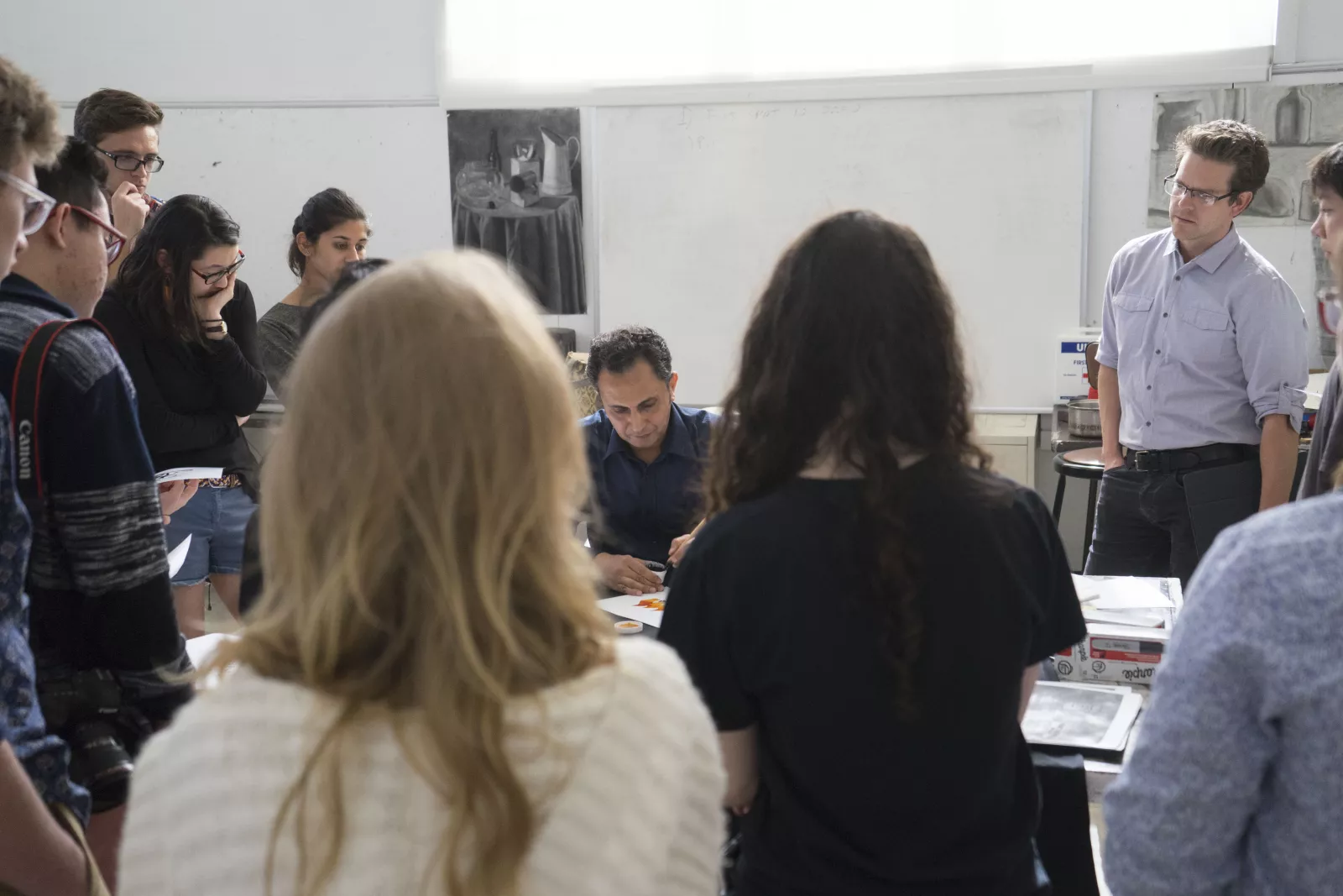 Students gather for calligraphy demo