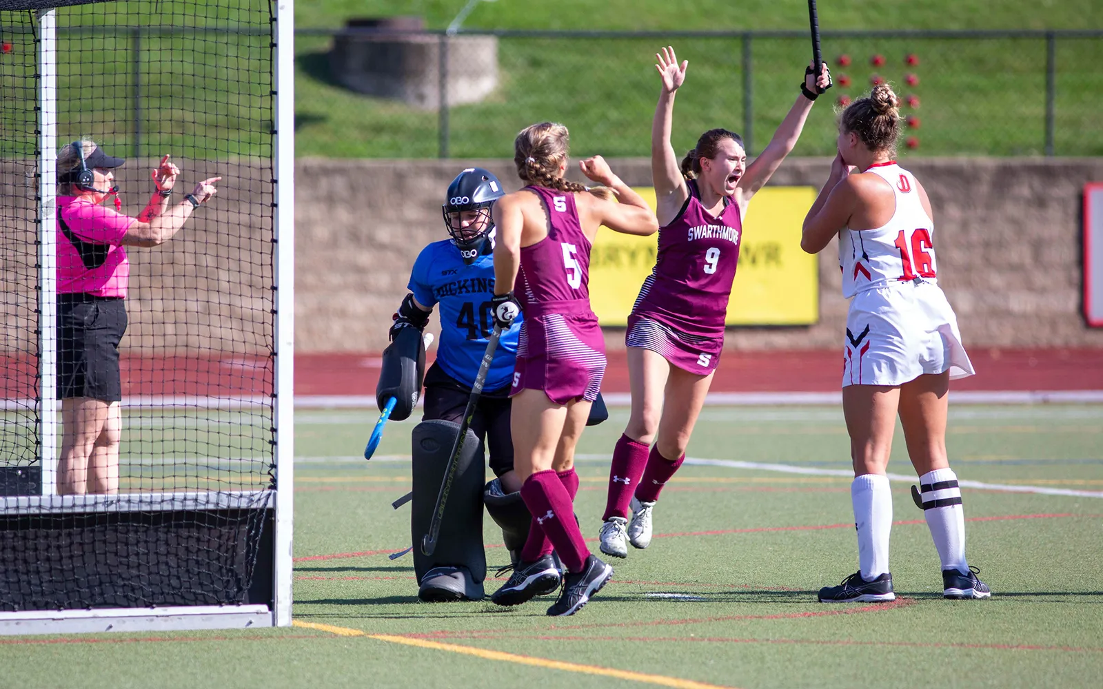 Field hockey player celebrates