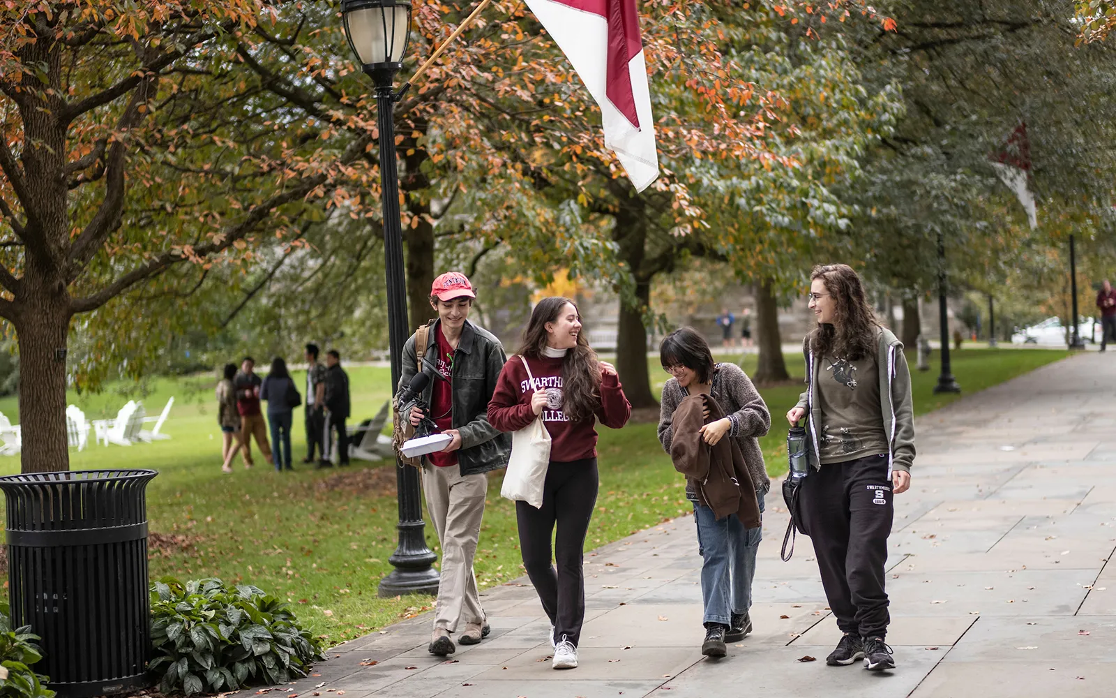 People walk on campus