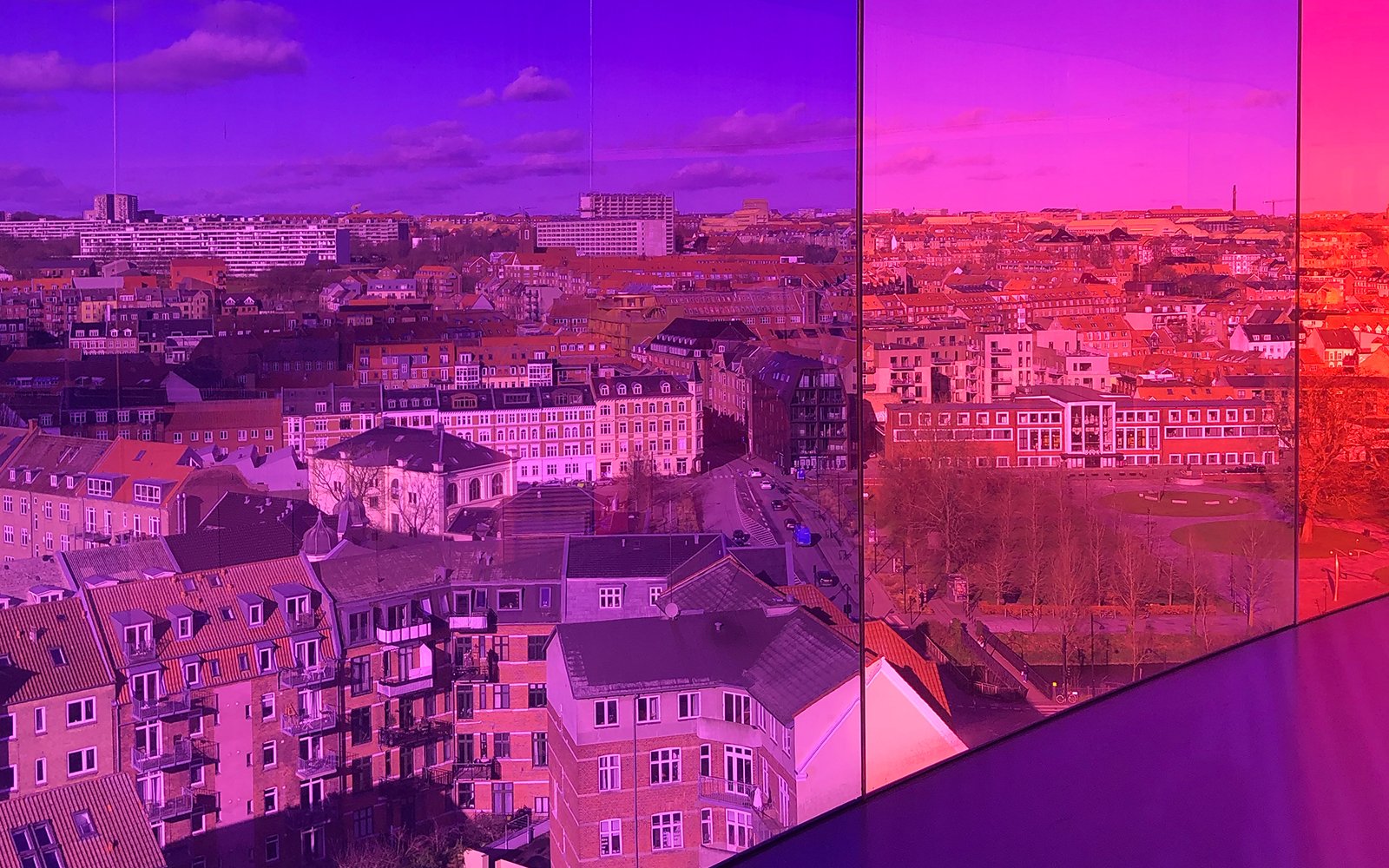 View of city through windows with colorful filters