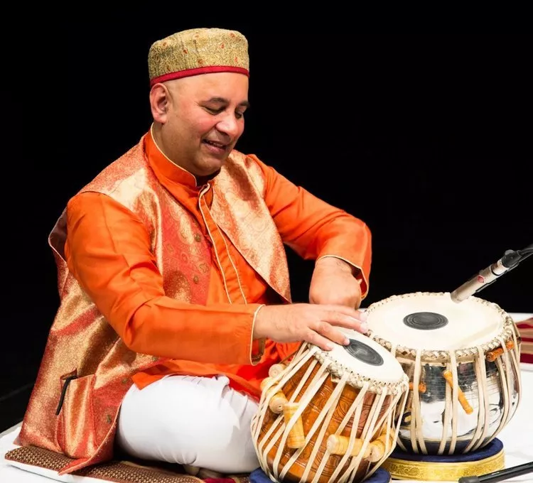 Samir Chatterjee plays the tabla. 