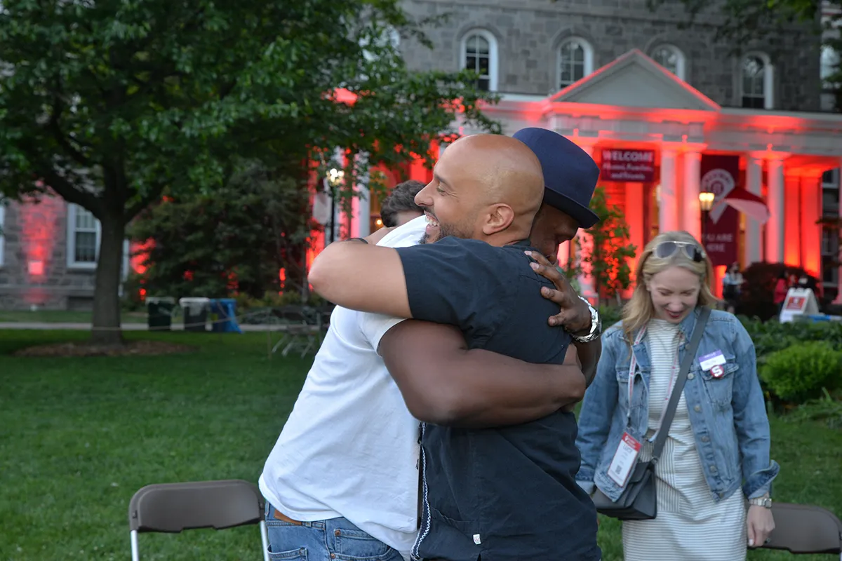 Two people hug on Parrish Beach