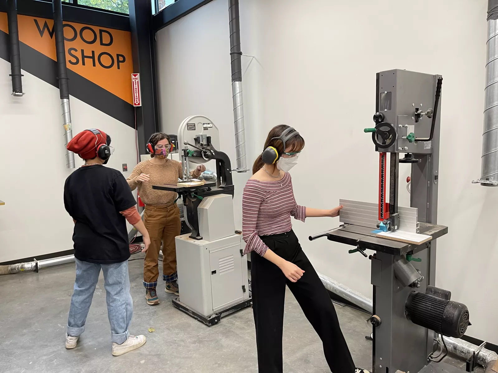 Sculpture class students working inside the MakerSpace.