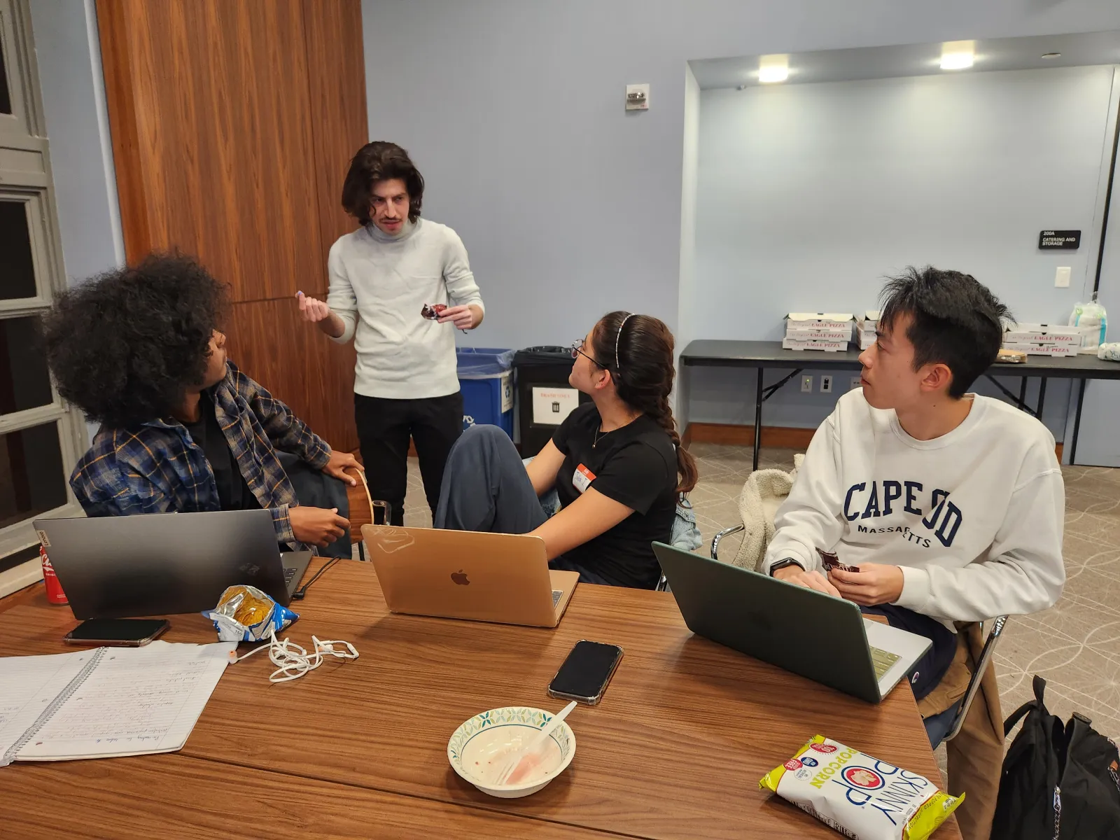 Students listen to a student mentor