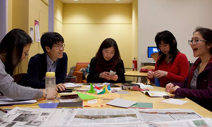 Students practice origami 