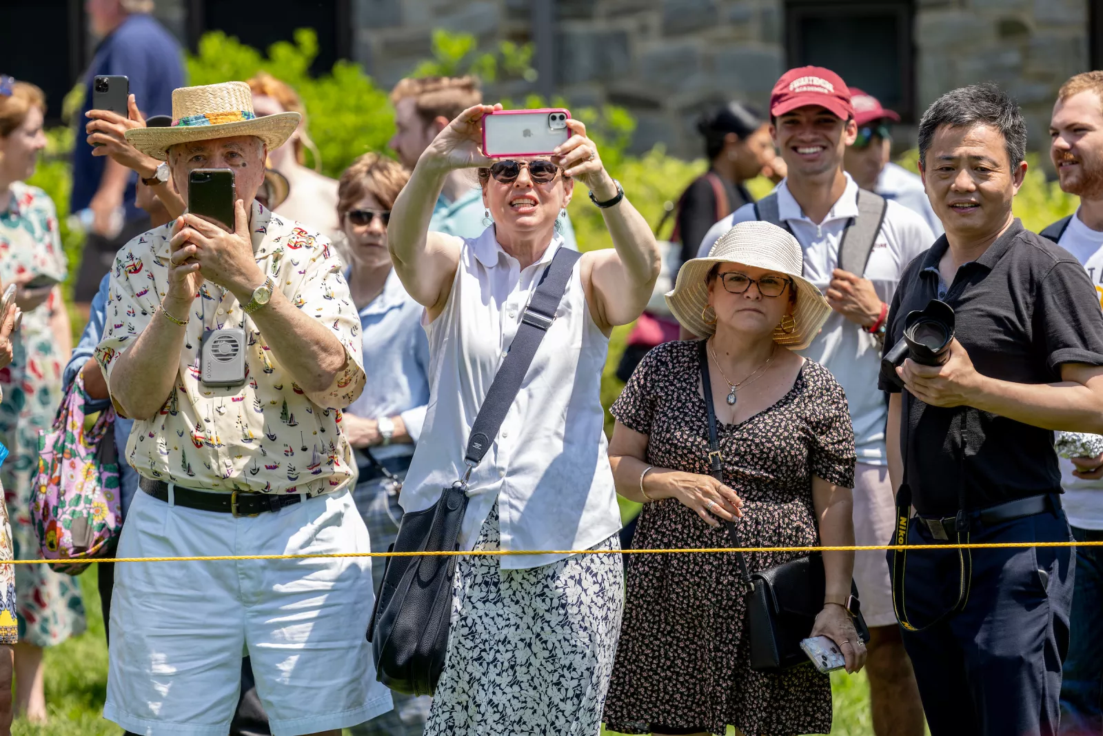 Group of parents cheer at commencement