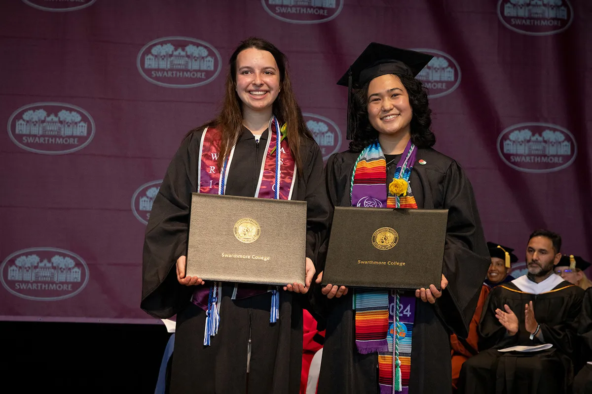 Kyra Roepke and Seungim Fruman poses with awards