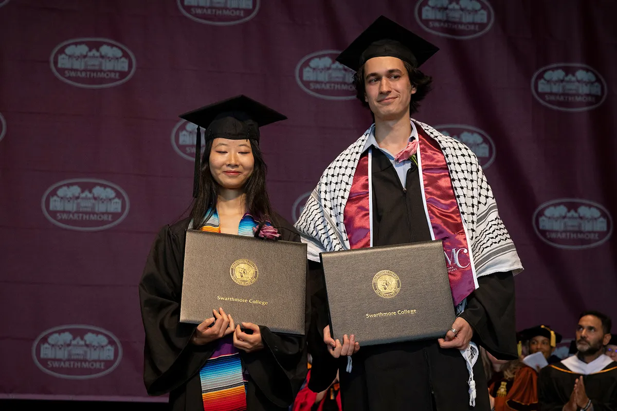 Ziming Yuan '24 and Nick Urick with awards