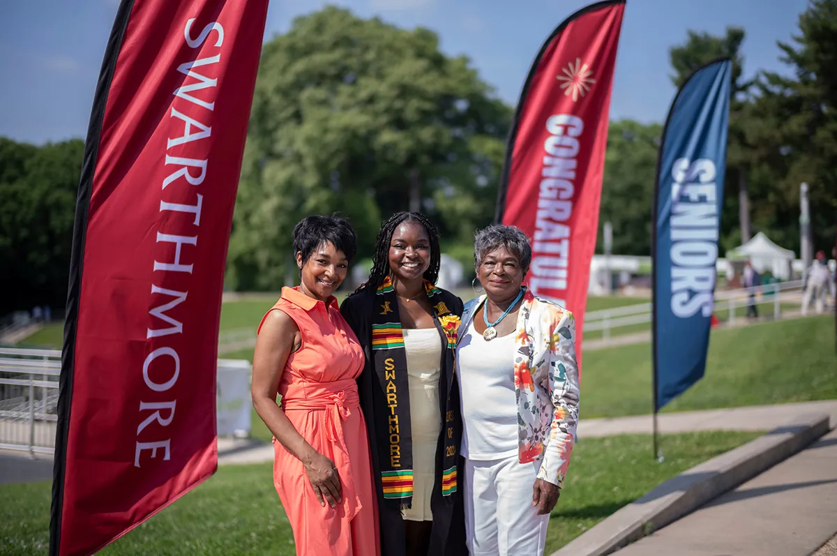 Student with family prior to commencement ceremony