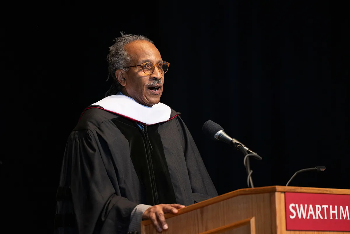 Louis Massiah speaks at podium