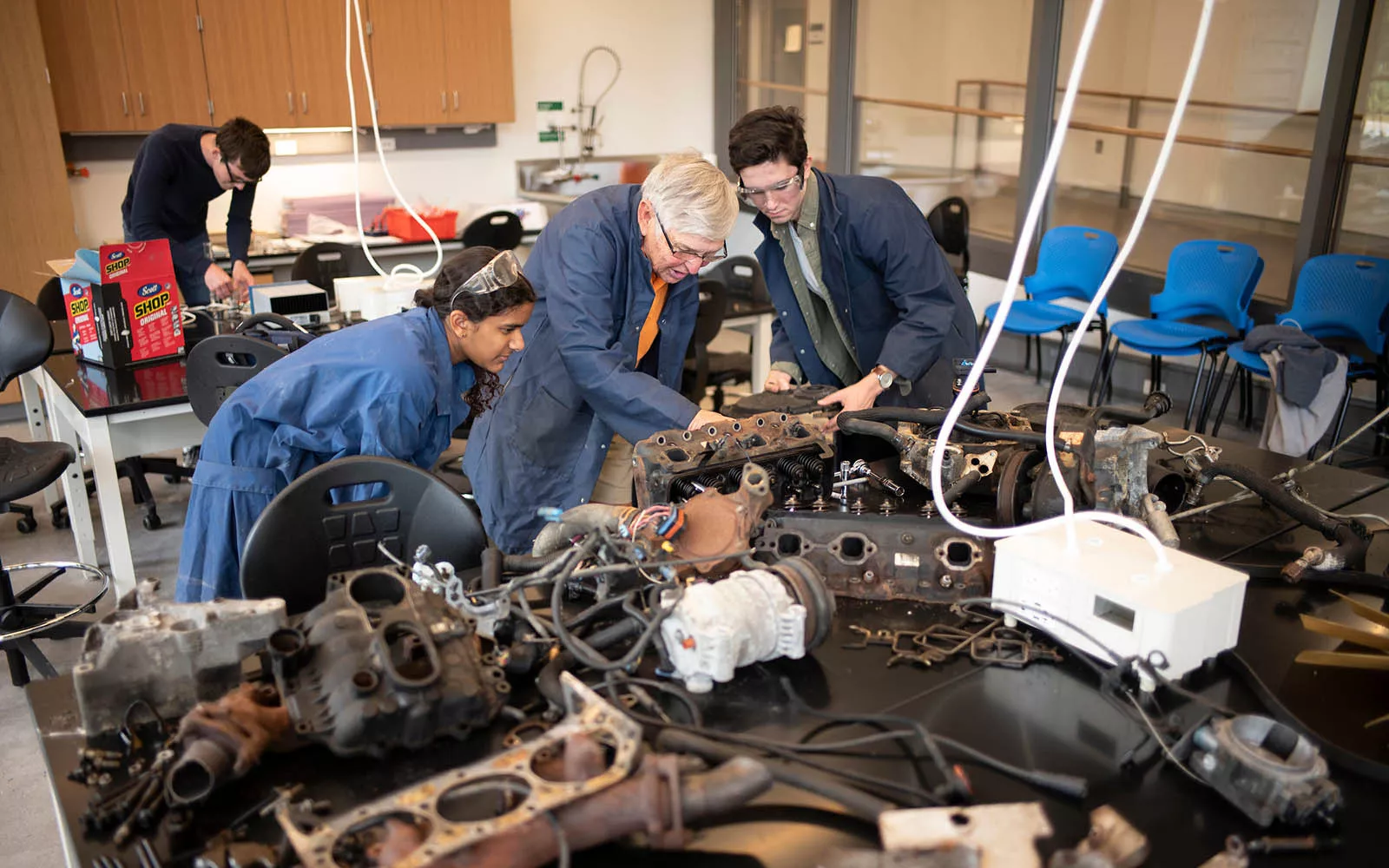 faculty and students working in a wokshop