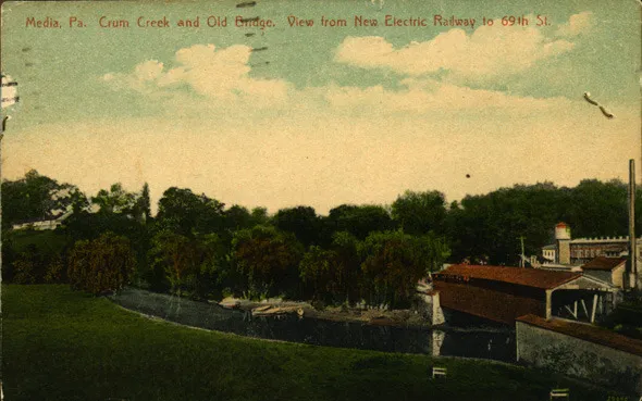 Colored postcard of the covered bridge over Crum Creek looking toward Swarthmore, ca. 1920