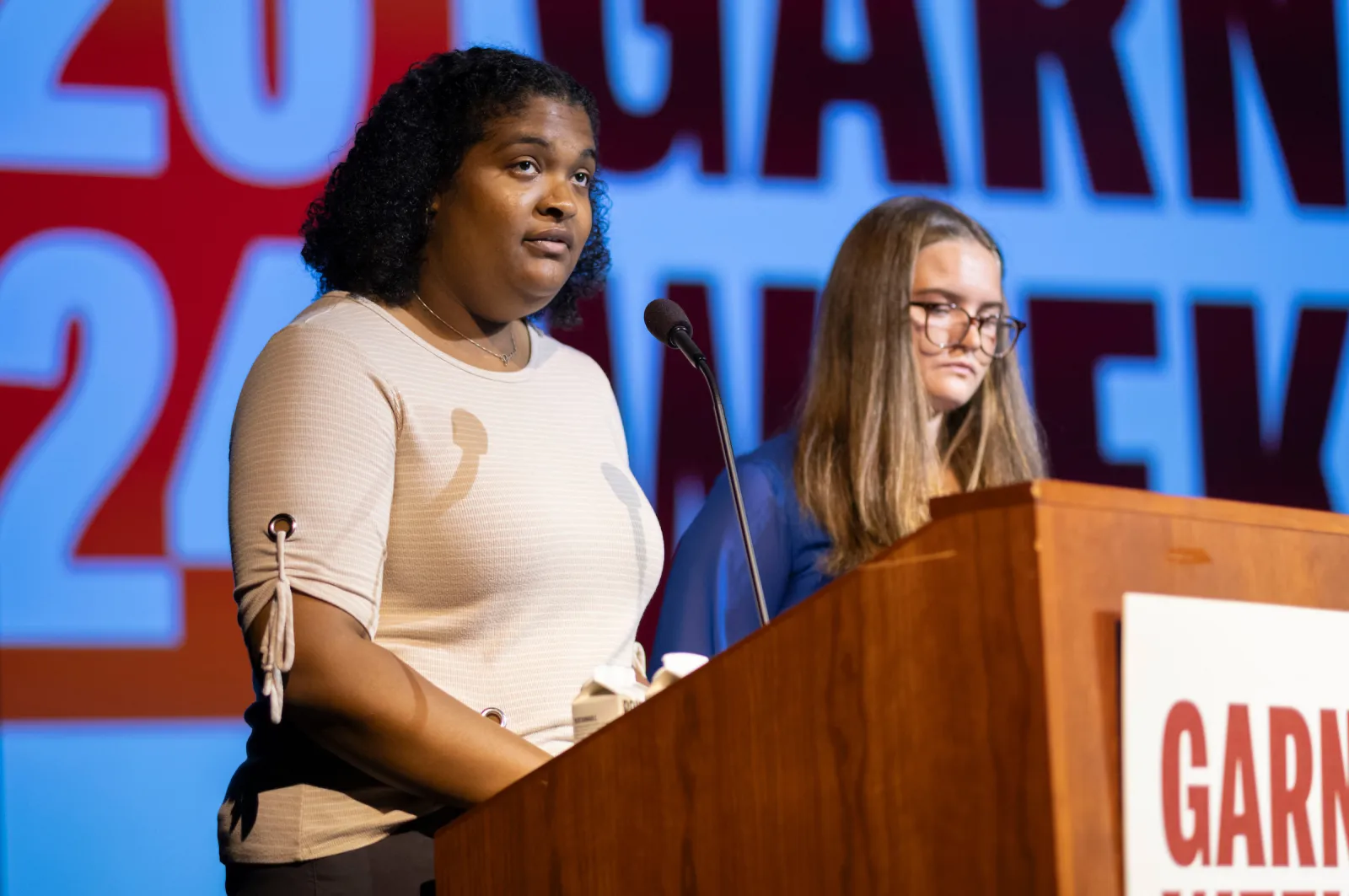 Students at podium during Garnet Weekend