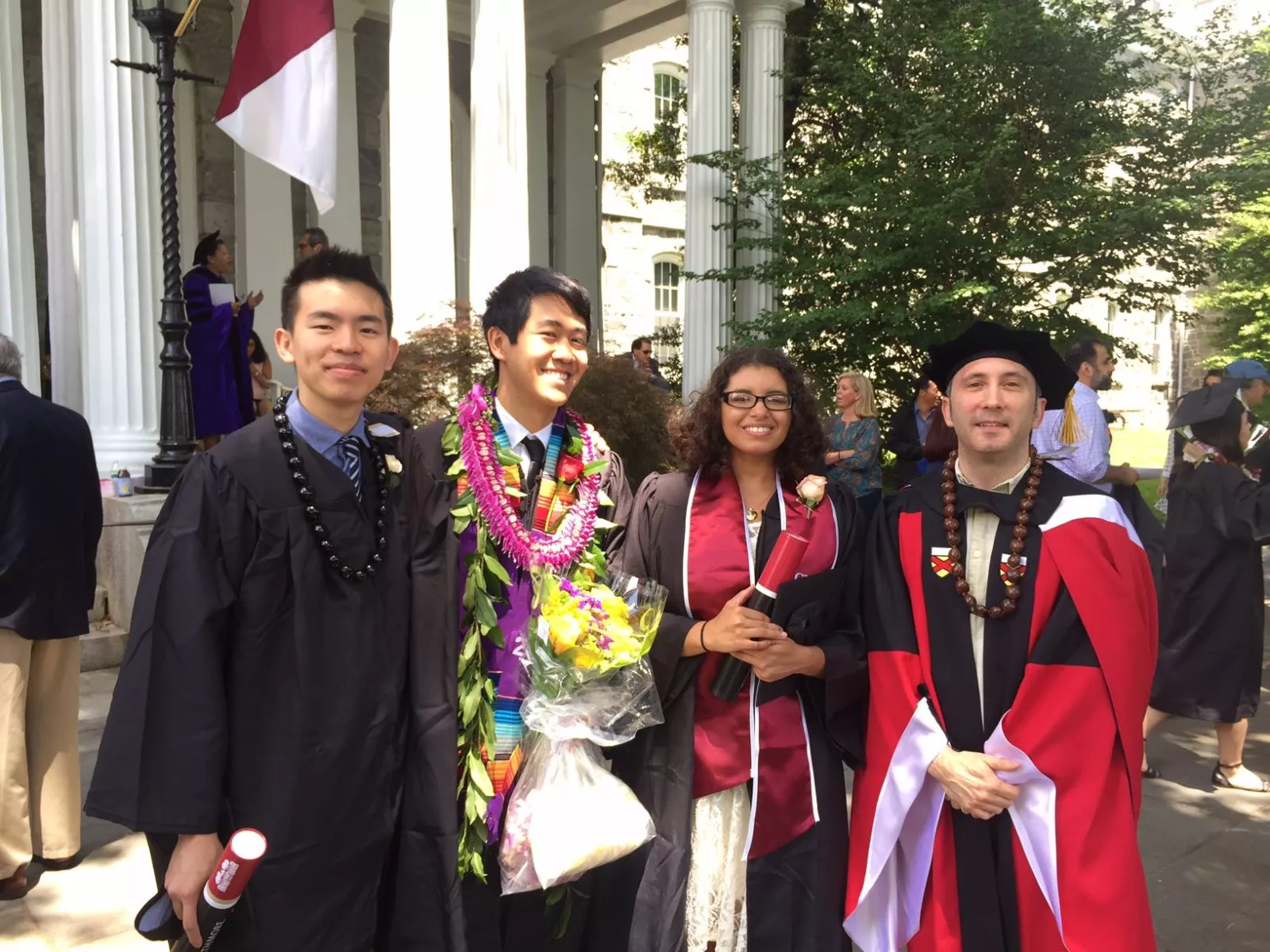 Students stand with Professor Will Gardner at Commencement 2017