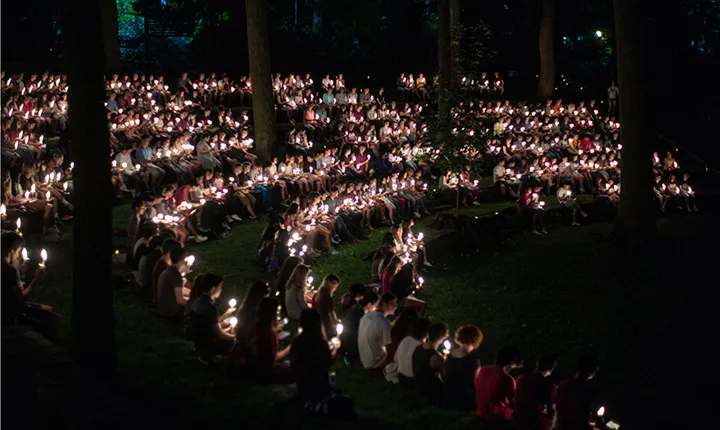 Scott Amphitheater lit by students with candles