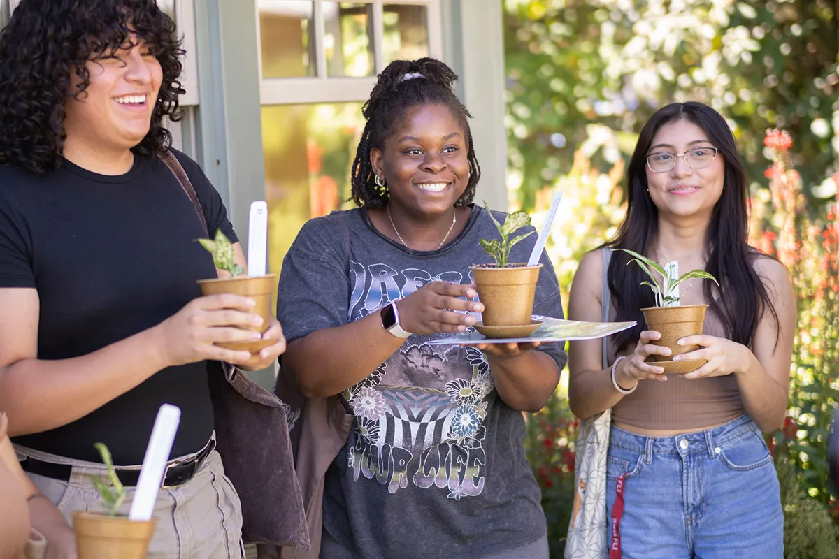 Students show off plants at arboretum giveaway event