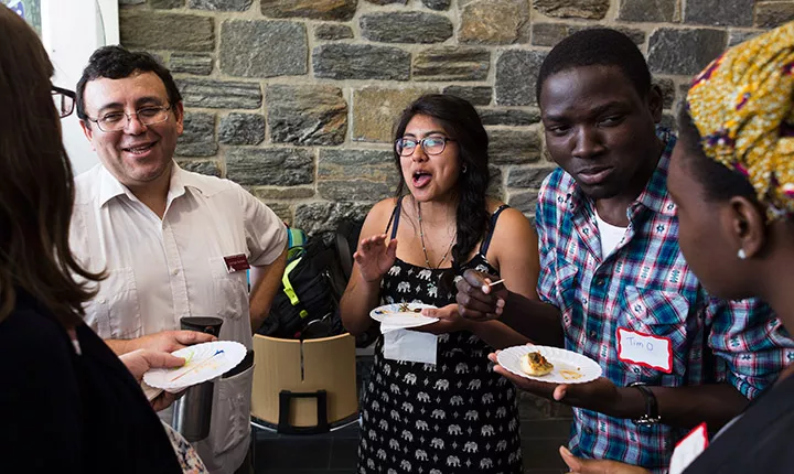 People eating food and laughing