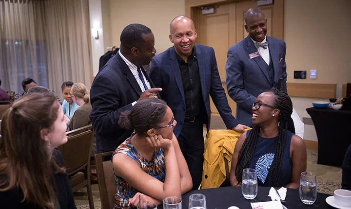 Stevenson talks to staff and students at a dinner