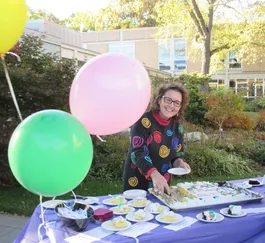 Mrs Halley serving the Mole Day Cake