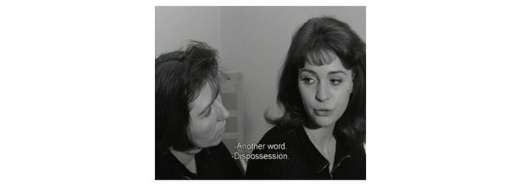 Still from the film of Anita and another woman talking.