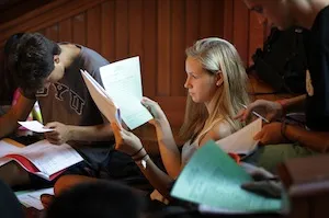 Students look over their schedules during the Department Advising Fair in Upper Tarble on August 30, 2012.