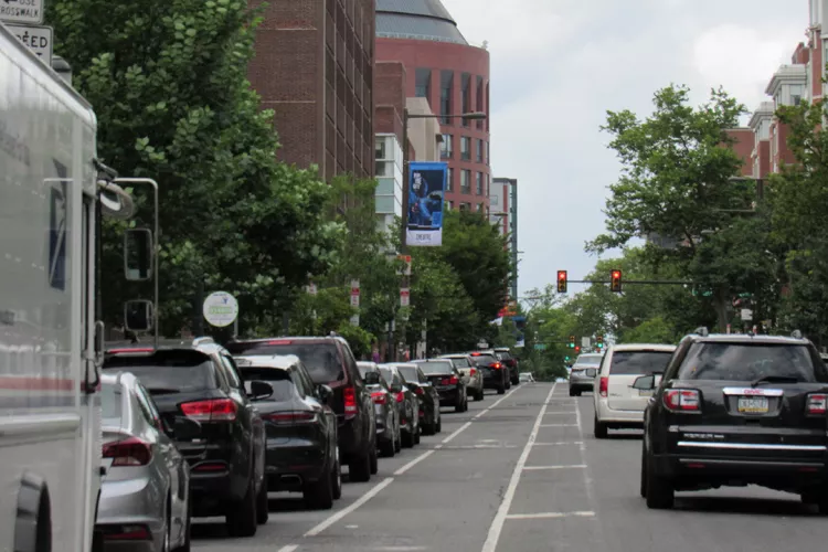 Line of cars on street