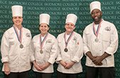 Cooks from Dining Services wearing silver medals