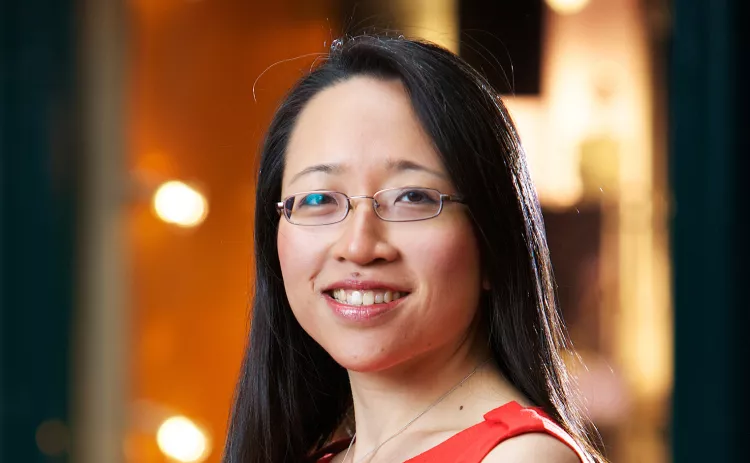 Portrait of woman wearing red