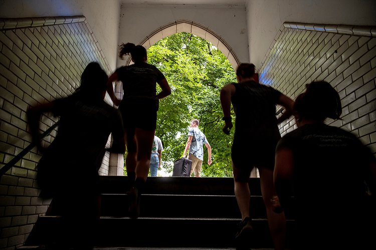Students run into Wharton courtyard