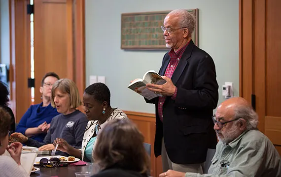 Maurice Eldridge '61 speaks at the book club